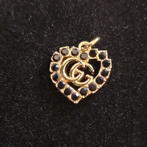 Gucci Gold and Black Heart Pendant